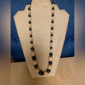 Black and beige beaded necklace.